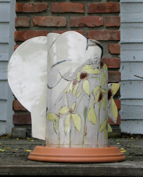 ceramic piece, Lady with Black-eyed Susans, by Harold Keller